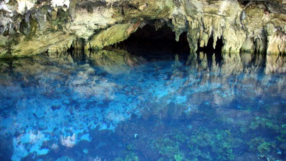 blue clear water in the cave