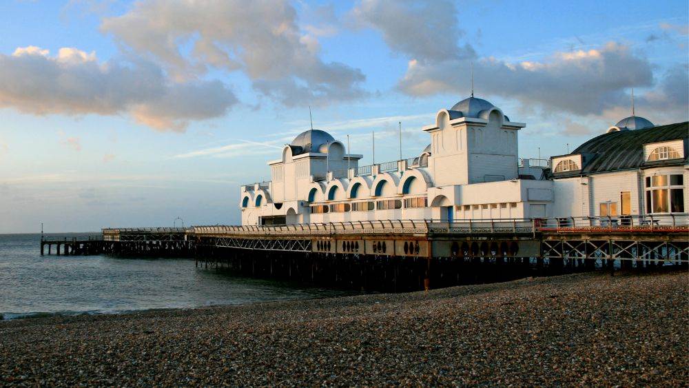 white building beside the body of water - Best Things to Do in Portsmouth, UK