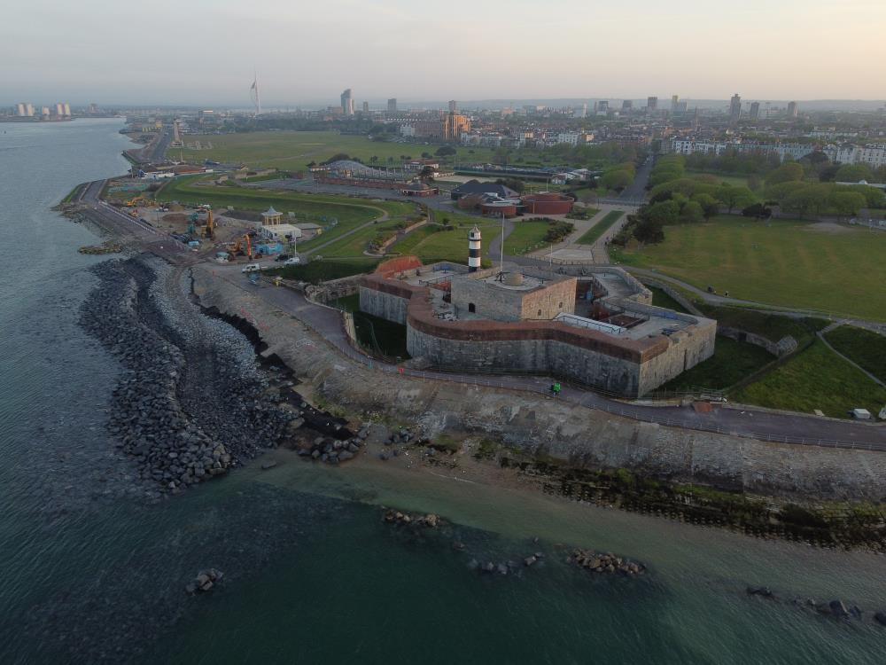 aerial view of a castle near the body of water with community - Best Things to Do in Portsmouth, UK