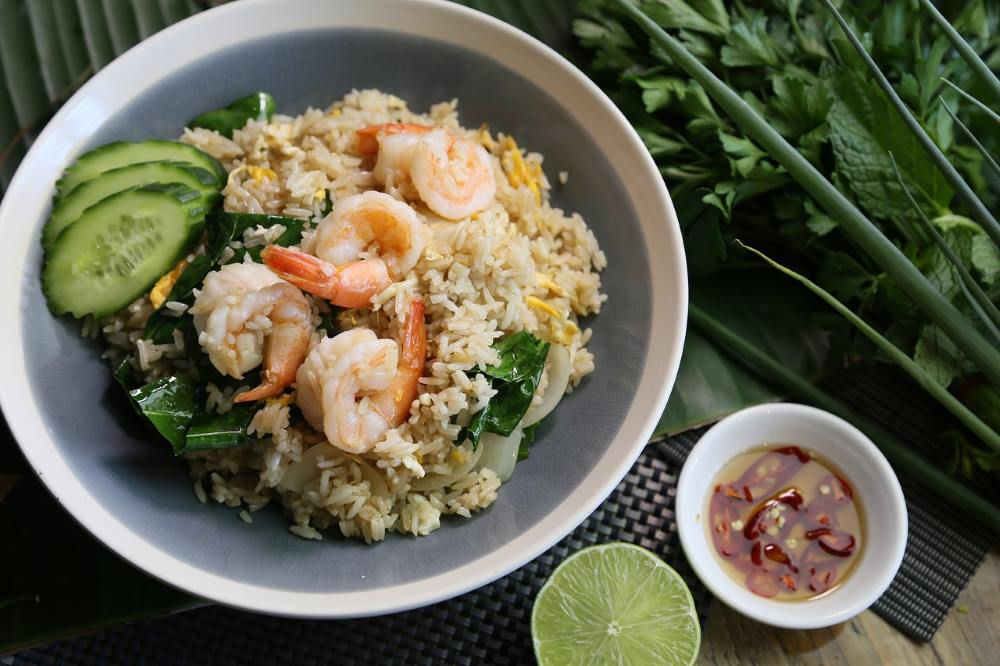 shrip on top of fried rice beside is cucumber slice - best thai food in thailand