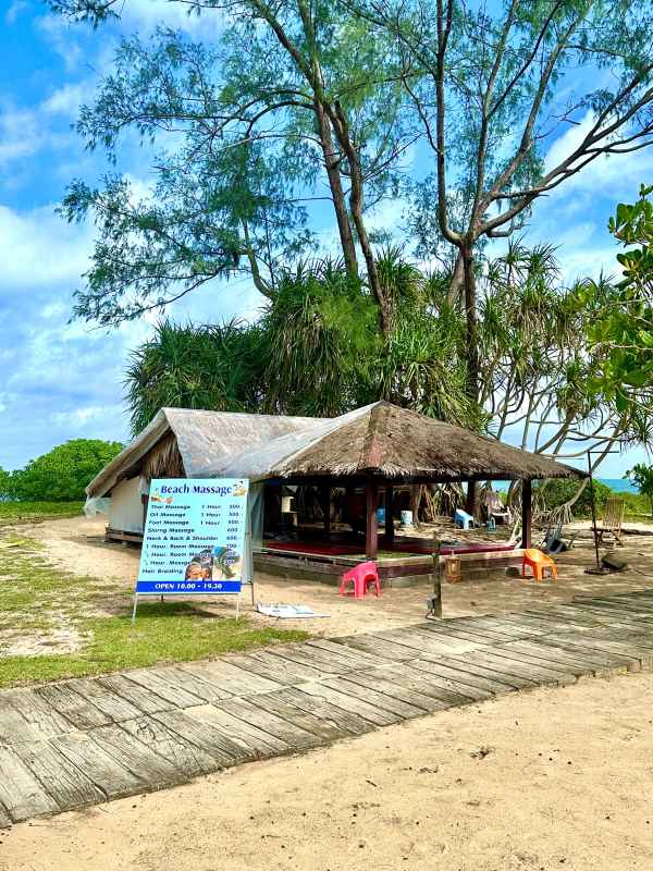 nipa hut offering beach massage