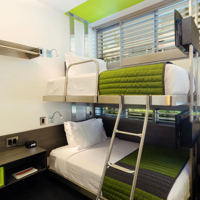 double deck bed in a tiny room
