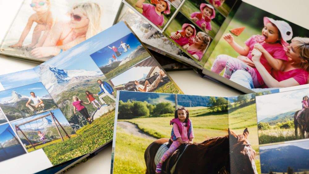 photobooks showing family travels - Fun Side Hustles for 50+ Nomadic Adventurers