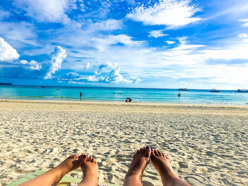 traveling the world with my family - my daughter and I on the beach