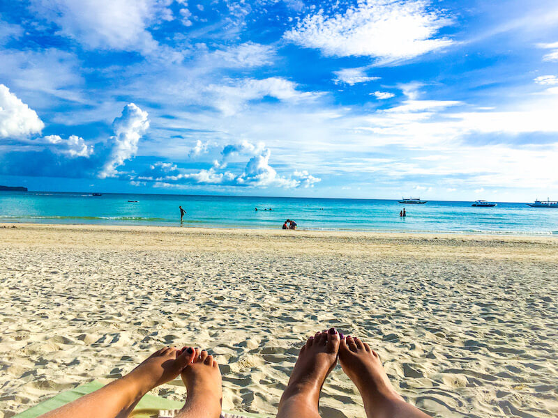 traveling the world with my family - my daughter and I on the beach