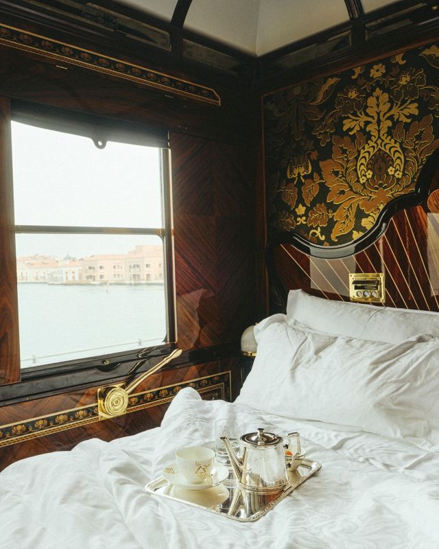 bed with tea pot on it - luxury train rides