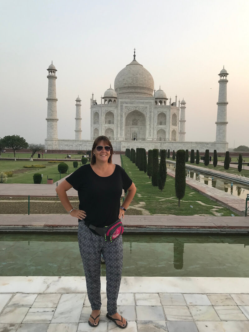picture in front of the famout Taj Mahal in India