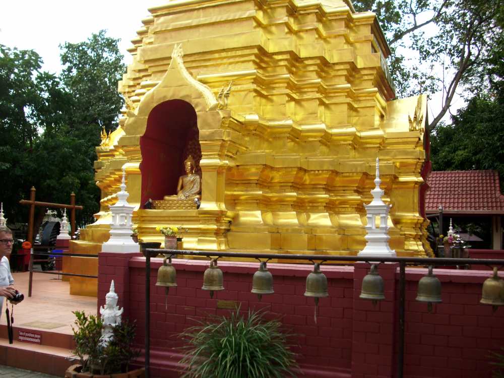 golden buddha in the middle of gold structure- chiang mai temples