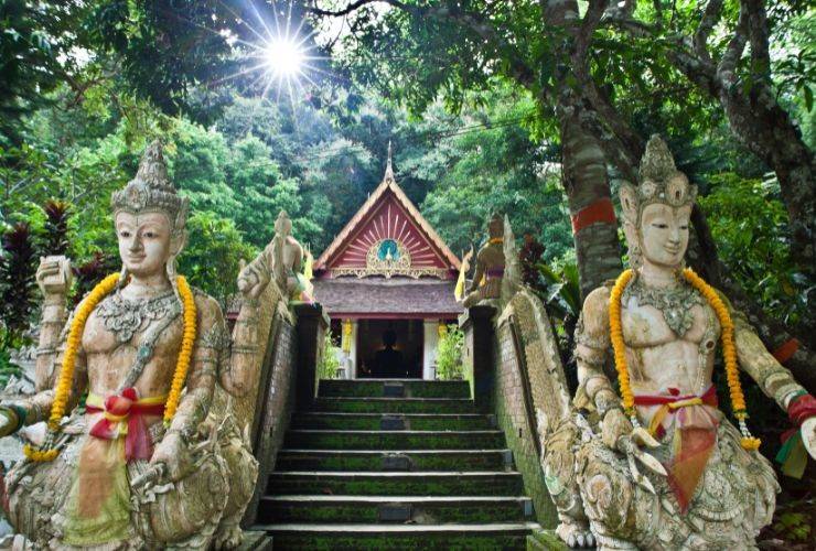 two statue on both side of stair - chiang mai temples