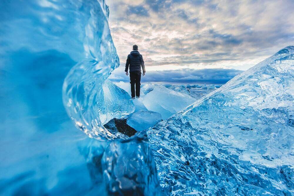 Man in back shows ice all over