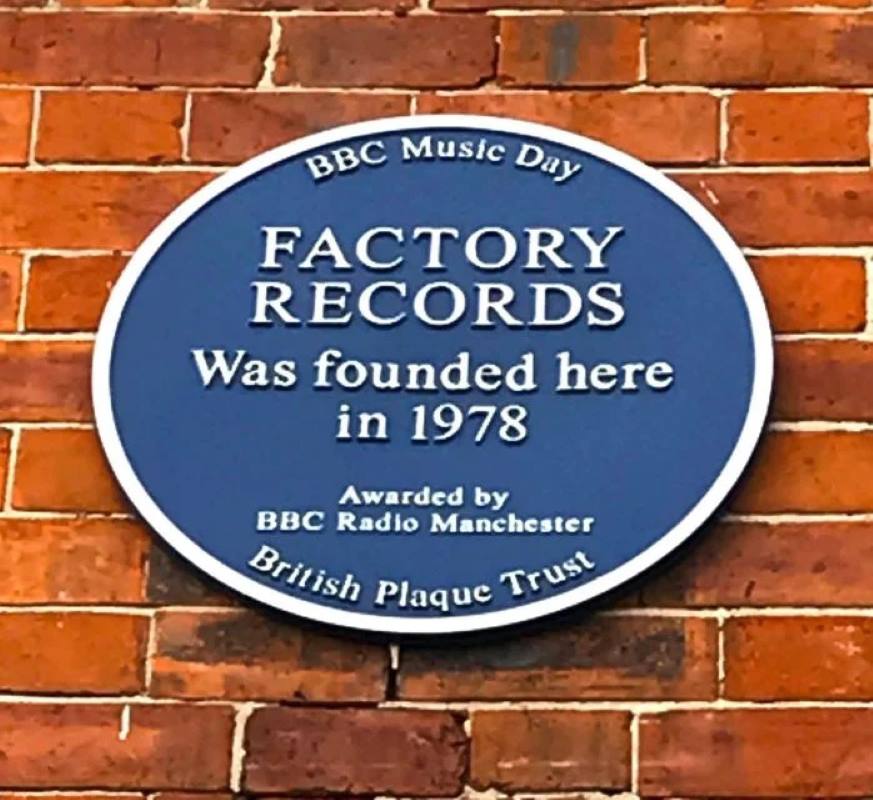 blue oval logo in the orange brick