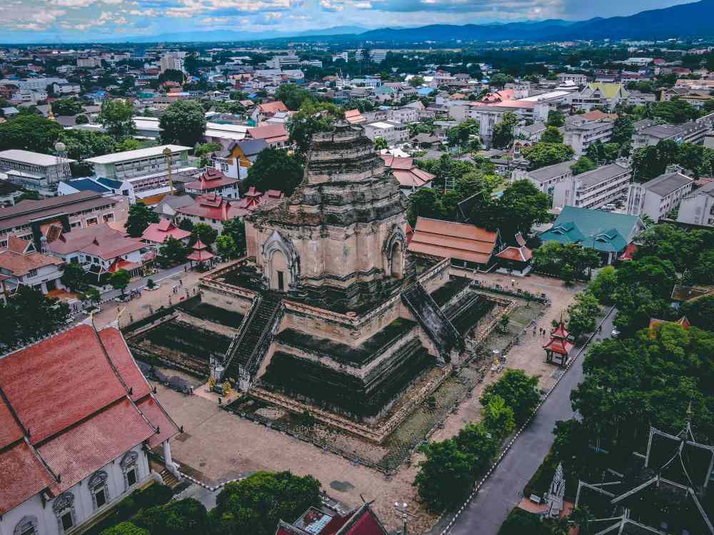 brown concrete in trhe middle of a community - thailand digital nomad visa