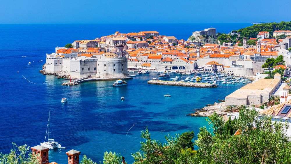 aerial view of a community near the blue ocean - Oldest Cities in Europe to Visit in 2025